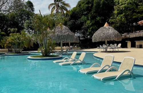 Playa Coronado Apartamento | Swim Up Suite 1115 with Golf for 2 and exclusive rights to all amenities!