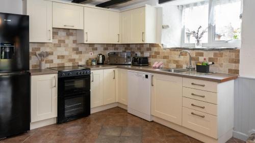 Fivelanes Casa | Ta Mill Holiday Cottages & Lodges - Forge Cottage