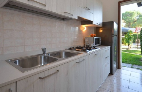 Bibione Villa | Tómese un descanso en nuestra hermosa villa con jardín privado de Beahost Rentals