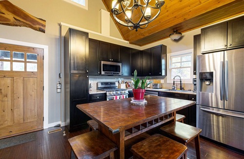 Cullowhee Casa | Take in the natural beauty from this elegant riverfront home