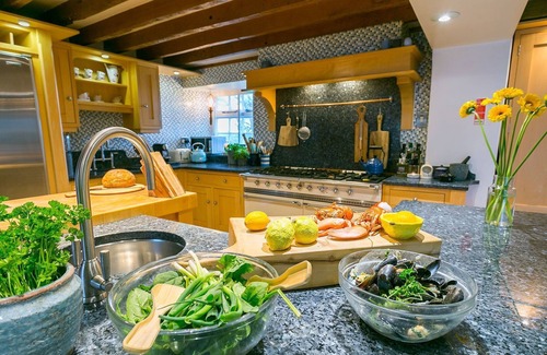 Bangor Cabaña | Tal y Bont Farm - a remote that sleeps 30 guests in 14 bedrooms