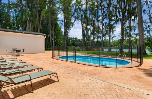 Lutz Otro | Tampa's immaculate private paradise heated pool lake house 1 acre