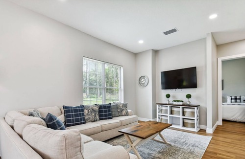Lutz Otro | Tampa's immaculate private paradise heated pool lake house 1 acre