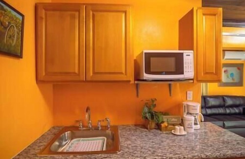 Coral Harbour Apartamento | Tangerine Sunsets Mango