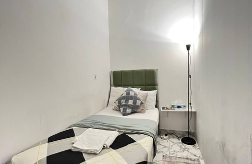 Al Wahdah Apartamento | Tanih Place 6