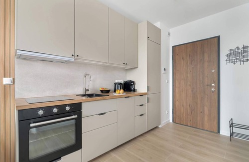 Stare Miasto District Apartamento | Tasteful Apartment with Parking and Gym by Noclegi Renters