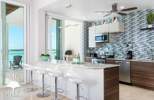 Ocean Point Casa | Caicos Cays Villa, una villa de lujo frente al mar de 4 dormitorios con impresionantes vistas.