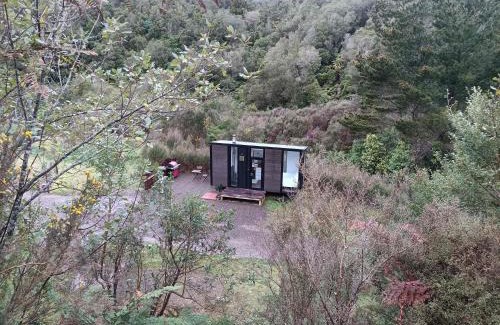 Shannon Casa | Te Paki Dam View by Tiny Away