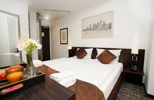 Bahnhofsviertel Hotel | The Atrium Hotel