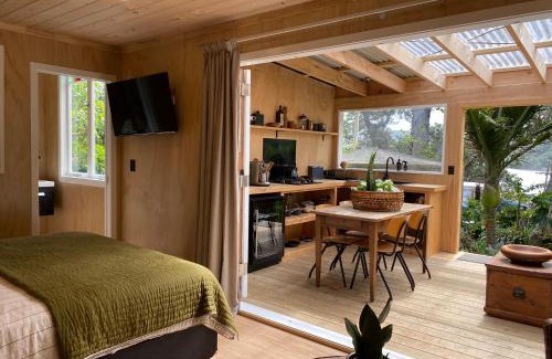 Tryphena Casa | The Bay Cottage - Located Directly Across the Road from 2 Swimming Beaches