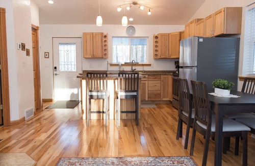 Egg Harbor Cabaña | The best patio and firepit at The Cat's Lair in the woods! Level 2 EV charger!