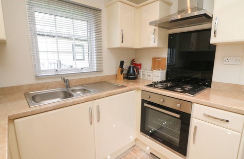 Yealand Conyers Cabaña | THE BOBBIN, NUMBER 11, pet friendly, with pool in Carnforth
