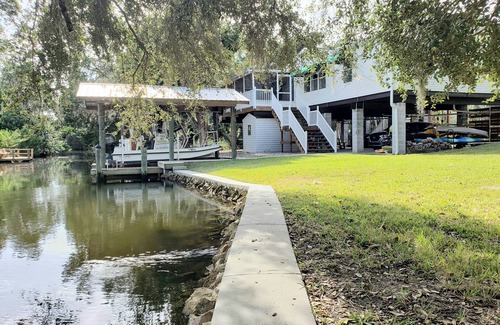 Crystal River Casa | The Bonefish—Mellow Ozello Canal Stilt Home—Kayaks, Dock, King Beds, Gulf Access