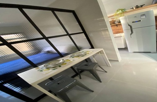 Itarare Apartamento | The building faces the beach and the kitnet has a wide view of it.