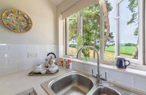 Ipswich Cabaña | The Buttery es una encantadora casa de vacaciones perfecta para una pareja que busca escapar
