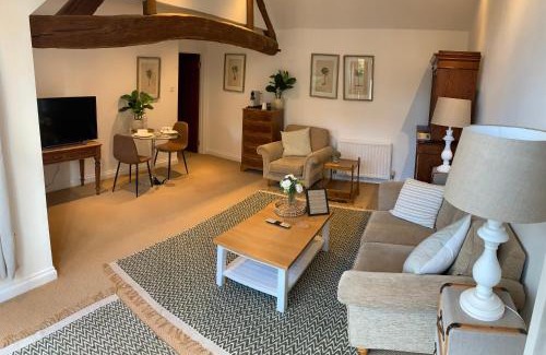 Frilford Cama Y Desayuno | The Byre, barn conversion king suite