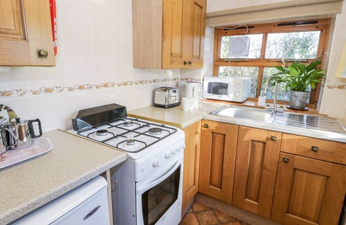 Rhosybol Cabaña | THE BYRE, character holiday cottage, with open fire in Dulas