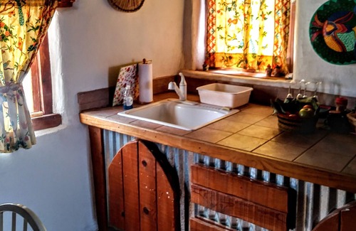 Garfield Casa | La Casita en la iglesia de San Francisco de Sales, Hatch, NM - Experimenta la historia