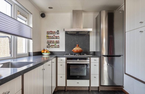 Ouddorp Casa | The charmingly furnished holiday home with luxurious amenities and a spacious private garden is located near the sea and dunes.