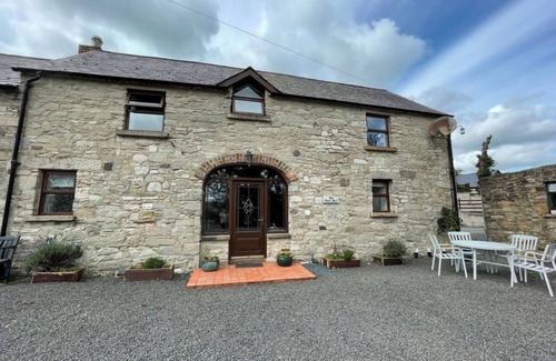Newtownards Cabaña | The Cornmill at at Ballystockart Cottages, your home from home.
