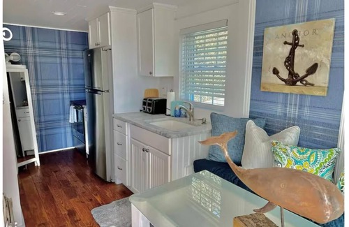 Newport East Cabaña | Bienvenido a "The Cottages"