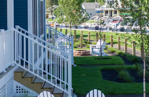 Sylvan Beach Cabaña | The Cove at Sylvan Beach - Pet friendly lakeside cottage with a pontoon boat!
