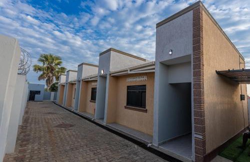 Soroti Apartamento | The Den Soroti Red & White