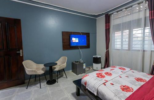 Soroti Apartamento | The Den Soroti Red & White
