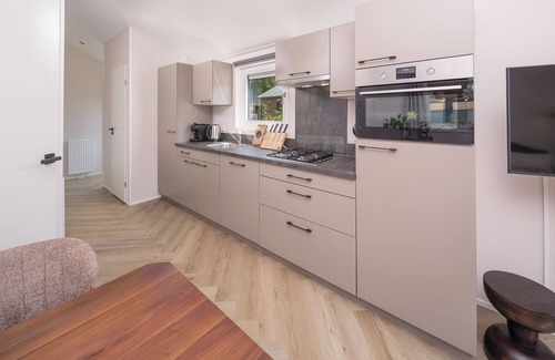 Lieren Casa | The Doornenburg Lodge offers a comfortable holiday home for 6 people with modern amenities and a private terrace in the Veluwe.