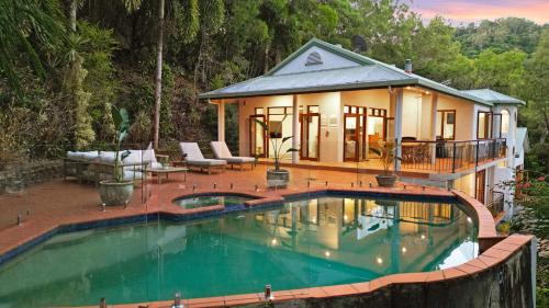 Clifton Beach Casa | The Ferns Villa Serene Rainforest Retreat with Ocean Breezes