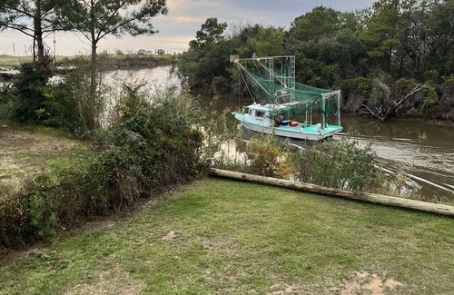 Ocean Springs Cabaña | The Fin & Feather. A Gorgeous Seaside Cottage.2 docks. An incredible experience!