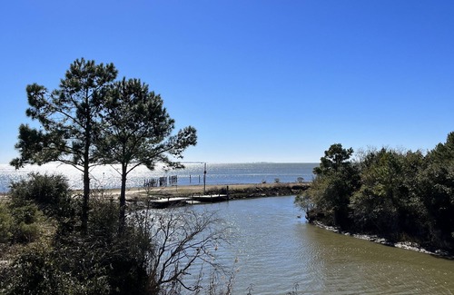 Ocean Springs Cabaña | The Fin & Feather. A Gorgeous Seaside Cottage.2 docks. An incredible experience!