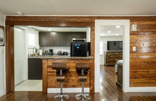 Meadows Condominio | The Fleming Suite | 1 bed, 1 bath condo w/shared pool, monthly rental
