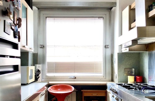 Cassia Apartamento | Penthouse "The Great Beauty". The large and bright apartment in the greenery of Rome