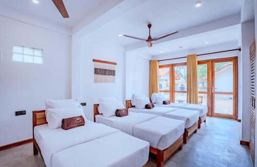 Pelena Complejo | The Green Rooms Surf & Yoga Camp - ON THE BEACH - Prime location Renovated 2024
