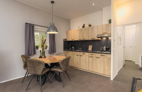 Lieren Casa | The Heide Lodge offers a luxurious and comfortable holiday experience on a spacious plot with a private garden and excellent amenities.
