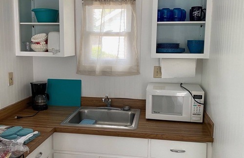 Oscoda Cabaña | The Hideaway- Haven on Huron A fresh and airy cabin directly on Lake Huron!