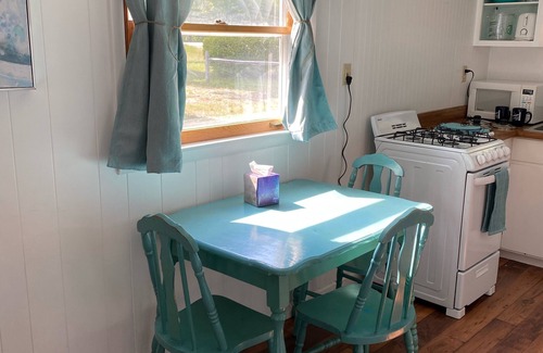Oscoda Cabaña | The Hideaway- Haven on Huron A fresh and airy cabin directly on Lake Huron!
