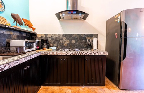 Isla Mujeres Apartamento | The Jardin Suite lower-level suite, poolside w/kitchen at Boutique Hotel