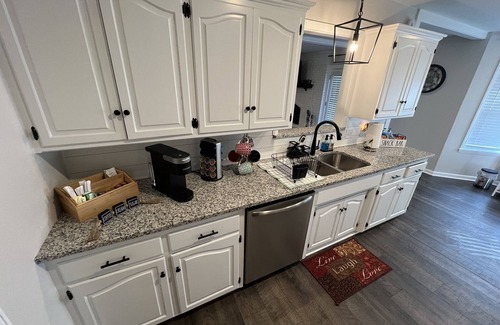 Fort Smith Casa | The Lily Pad. 3 bd/1ba. 4 beds. Center of town! Fenced backyard!