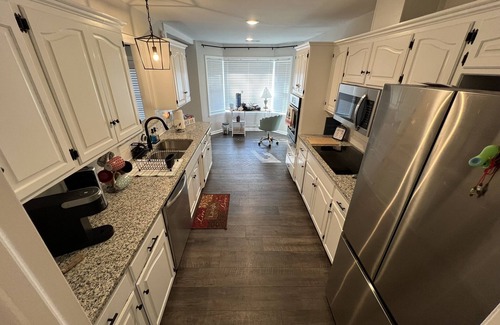 Fort Smith Casa | The Lily Pad. 3 bd/1ba. 4 beds. Center of town! Fenced backyard!