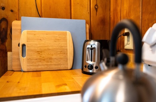 Rangeley Casa | The Little Red Camp - private waterfront on Rangeley Lake, wood stove and fire pit