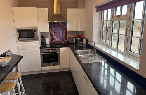 Little Somerford Cabaña | The Lodge, South Cotswolds, contemporary rural home, Spa Pool, views, parking