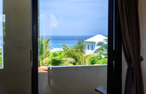 Isla Mujeres Apartamento | The Norte Suite at Boutique Hotel Bed and Breakfast with views of Caribbean Sea