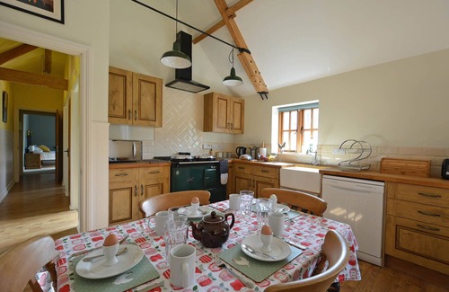 Nunney Casa | The Old Parlour - timber clad cosy converted cow shed