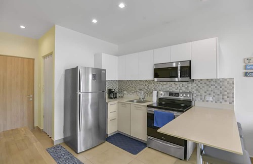 Bejuco Condominio | The Palms: Beachfront Condo with AC and pools!