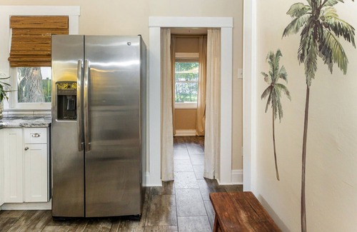 Old Seminole Heights Casa | The Palms Bungalow - Tampa getaway w/Paddle board. Pet-friendly!