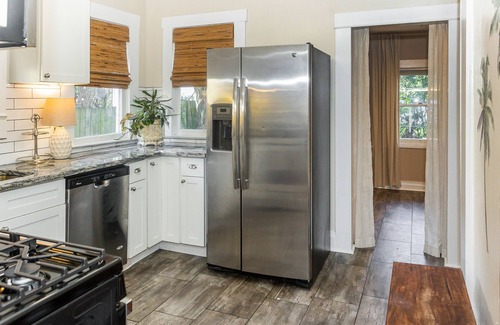 Old Seminole Heights Casa | The Palms Bungalow - Tampa getaway w/Paddle board. Pet-friendly!