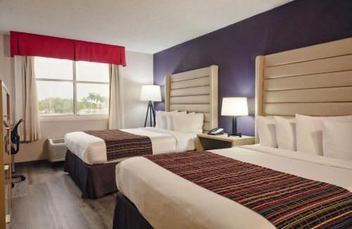 Ludlam Hotel | The Palms Inn & Suites Miami, Kendall, FL
