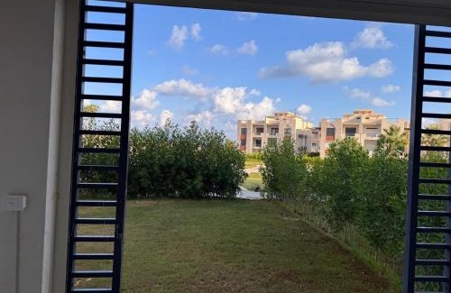 Ad-Dab'ah Apartamento | The Pearl Chalet Gaia Resort Ground floor with garden